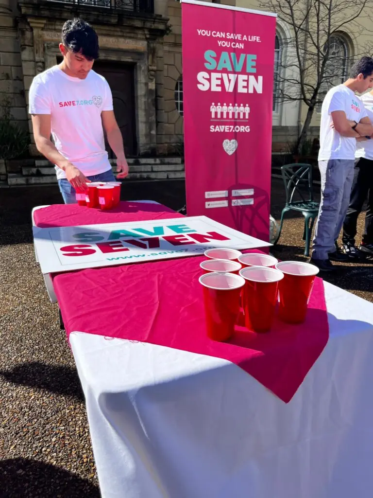 An in-person Save7 event